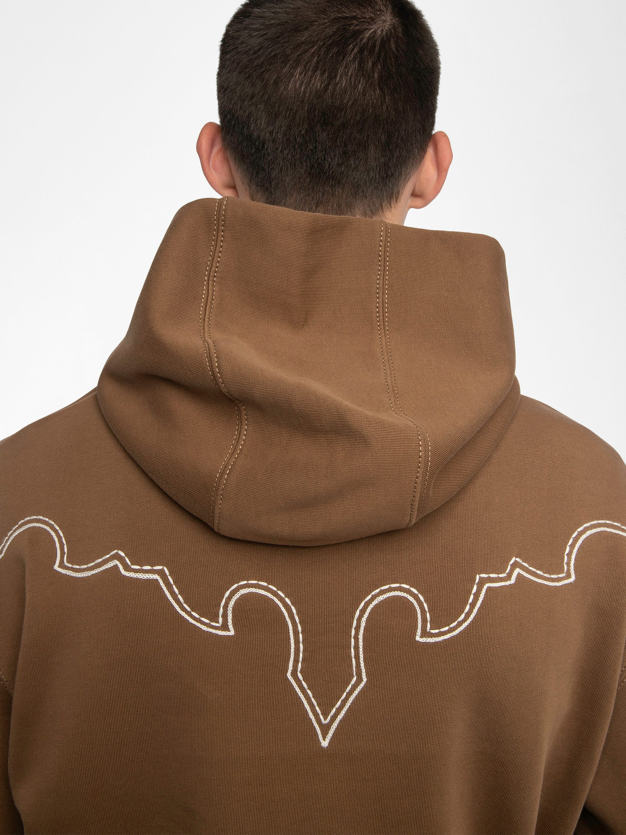 Sweeny Sweatshirt - Long-sleeved hooded sweatshirt with western cutouts.